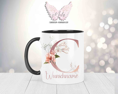 Blumen-Alphabet mit Name - Personalisierte Keramik-Tasse Schwarz