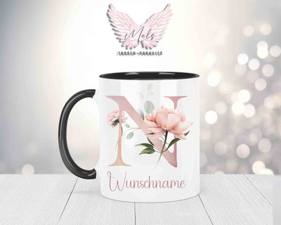 Blumen-Alphabet mit Name - Personalisierte Keramik-Tasse Schwarz