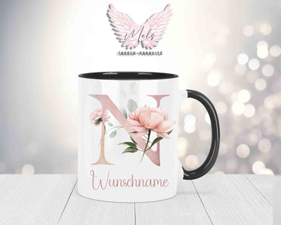 Blumen-Alphabet mit Name - Personalisierte Keramik-Tasse Schwarz