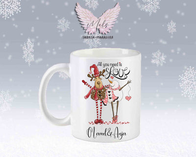 Tasse mit süßem Paar-Schneefrau und Hirsch – mit oder ohne Wunschname