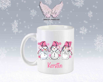 Tasse mit süßen Schneemänner mit rosa Mütze– mit oder ohne Wunschname